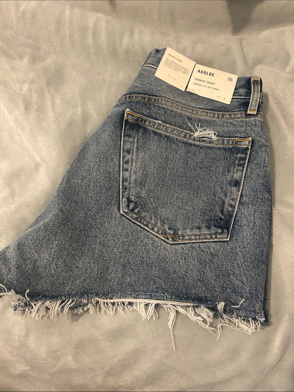 NWT Agolde Parker frayed hem denim shorts